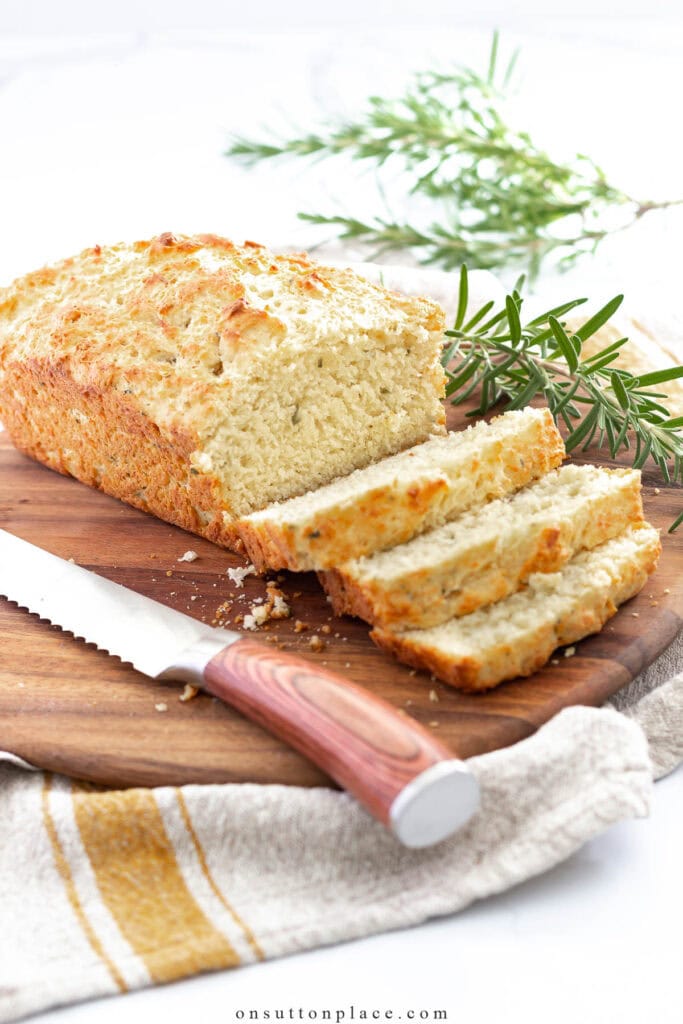 sliced homemade bread on a breadboard
