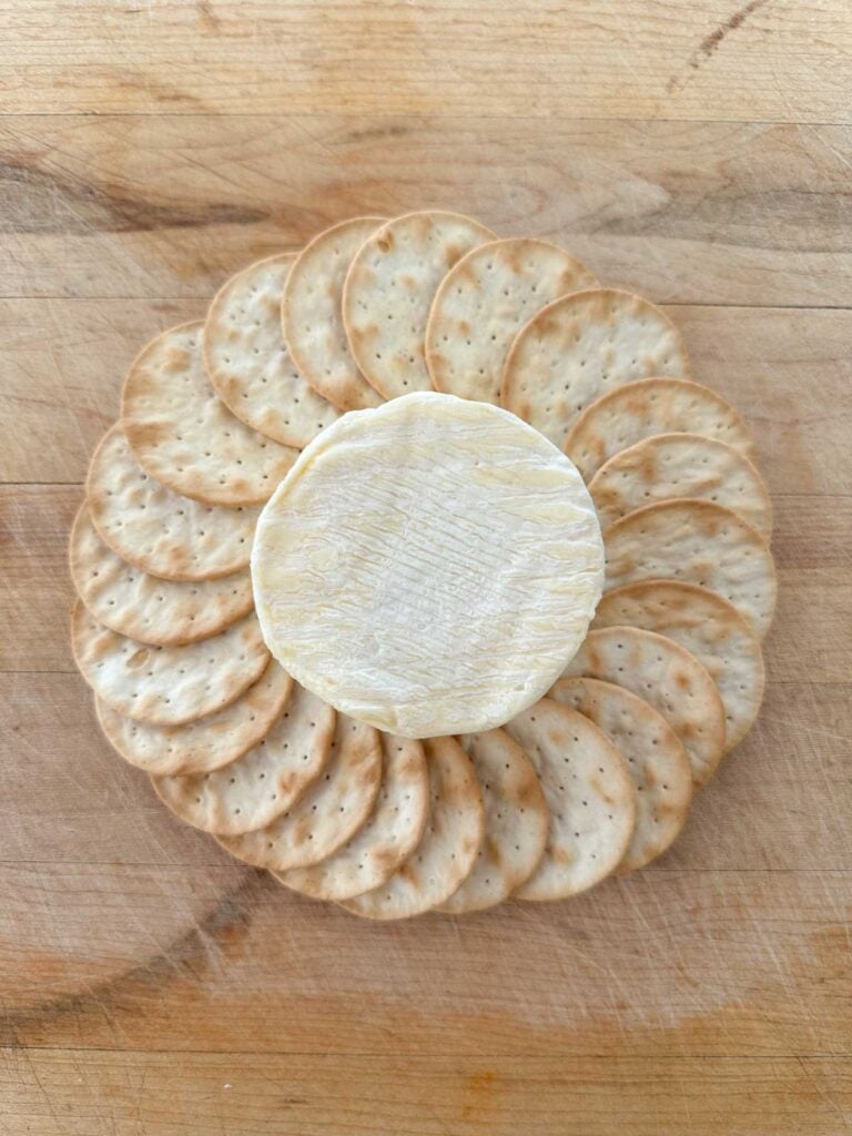 soft cheese surrounded by crackers