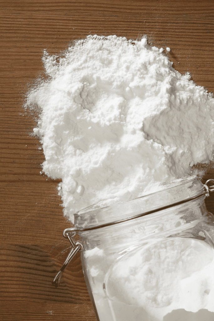 baking soda spilling out of a jar
