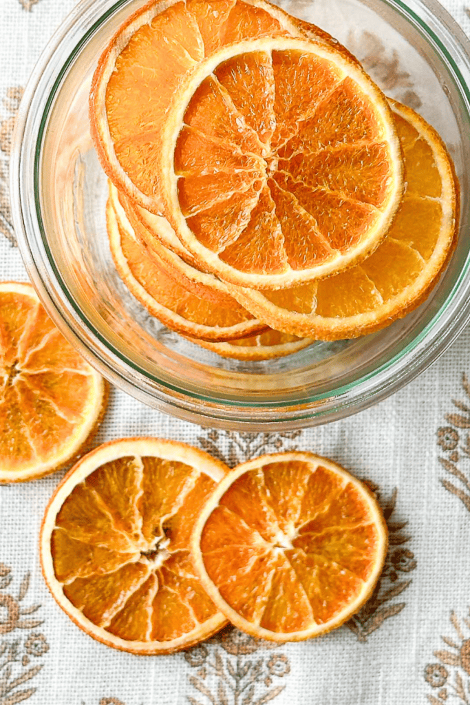 dried oranges in a glass jar-top view