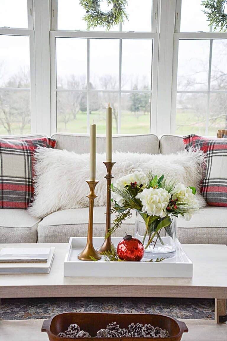 Christmas decor on a coffee table in a small room