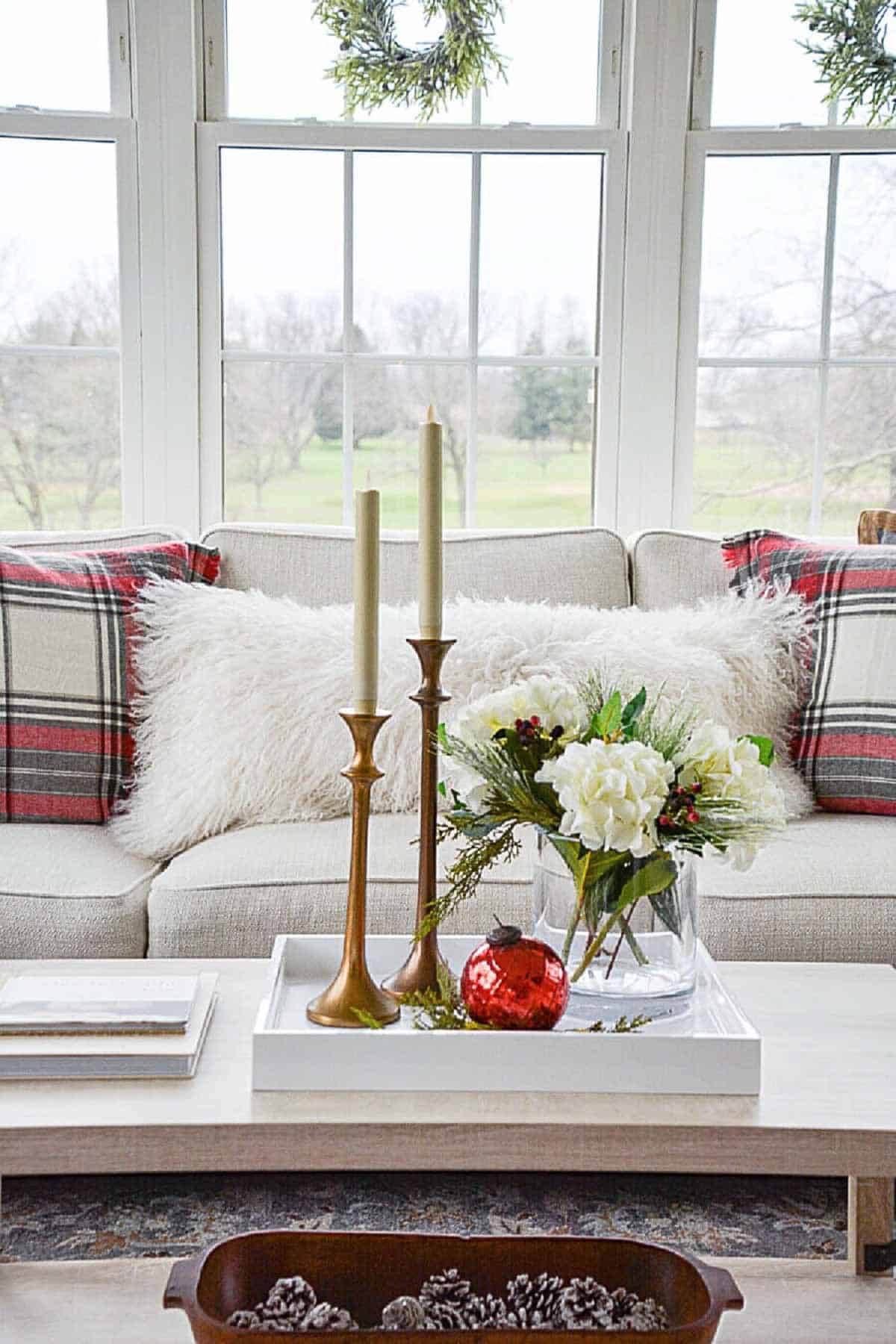 Christmas decor on a coffee table in a small room