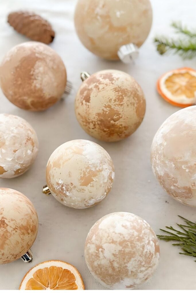 Christmas DIYs- distressed ornaments with greens and dried oranges