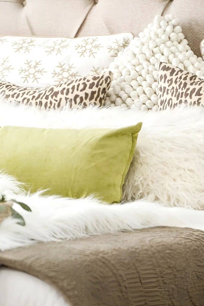 1 Christmas bed pillows in greens, white, and brown