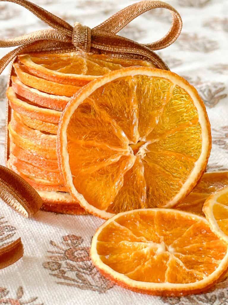 stack of dried oranges tied with a bow.