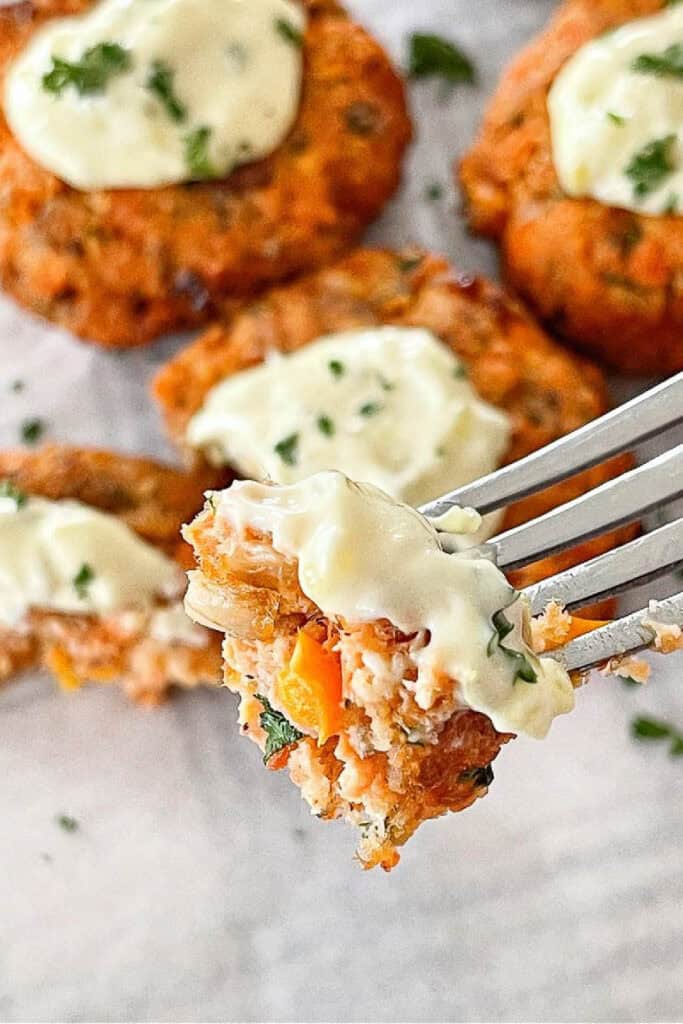 salmon cake, a bite on a fork