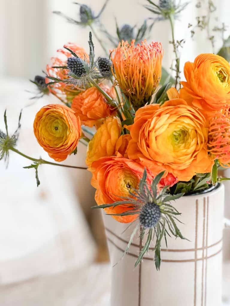 flowers arrangement in a pitcher
