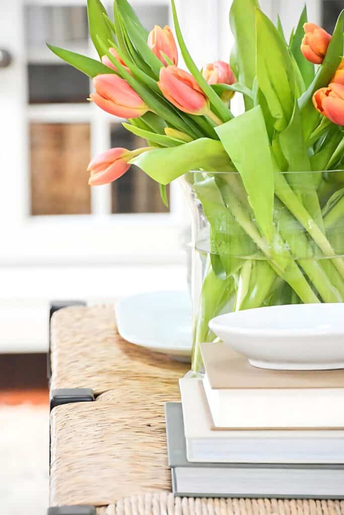 Easter decorations-glass vase of orange tulips