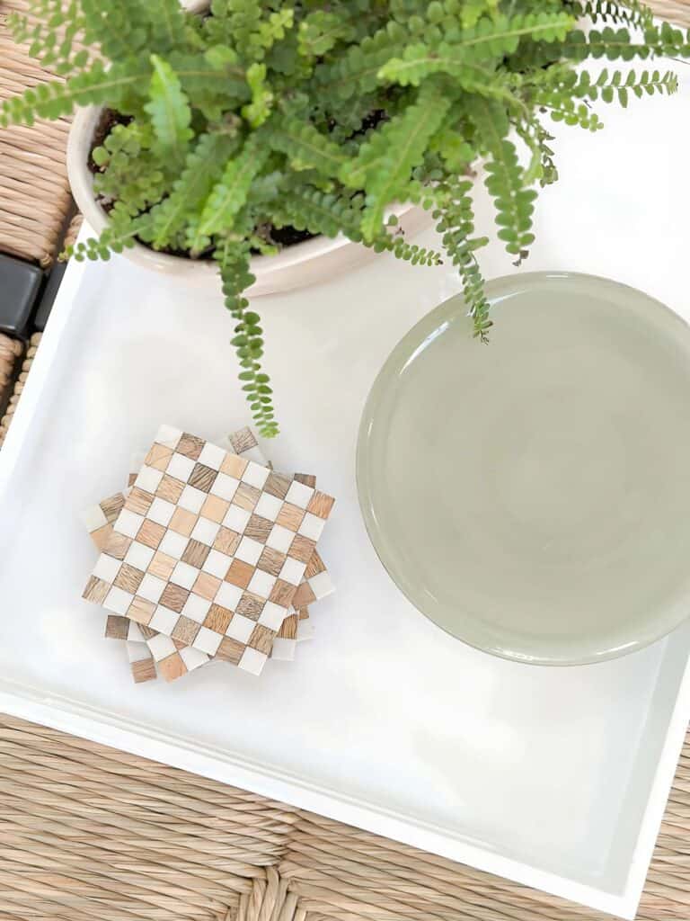 large coffee table-top view of vignette on a white tray