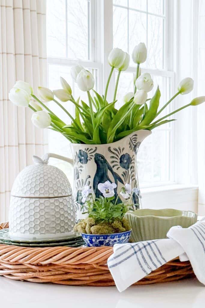 easy Easter decorating ideas using white tulips in a pitcher with simple spring kitchen decor