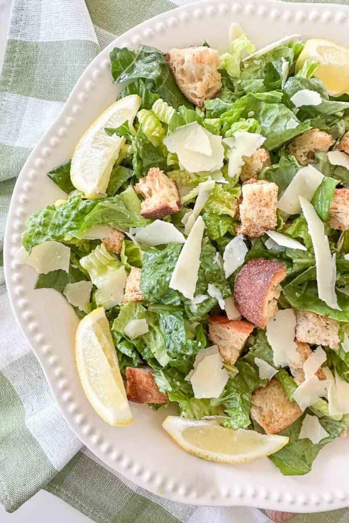 caesar salad in a white bowl