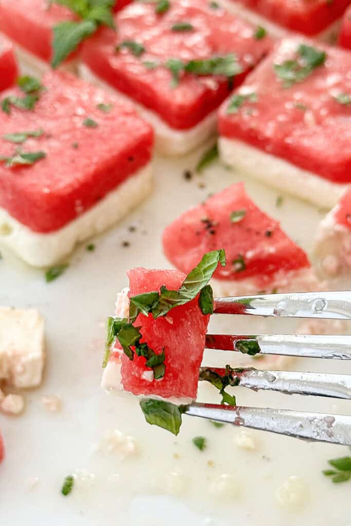 Watermelon Feta salad on a fork