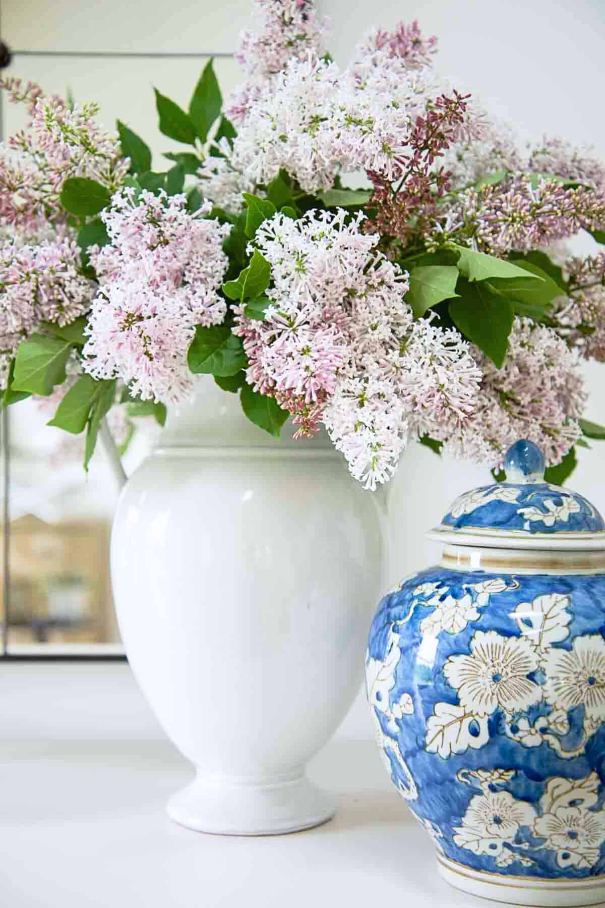 lilacs in a white vase