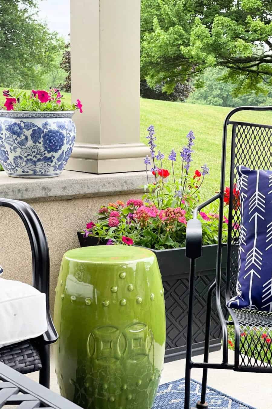 summer patio with planters of flowers