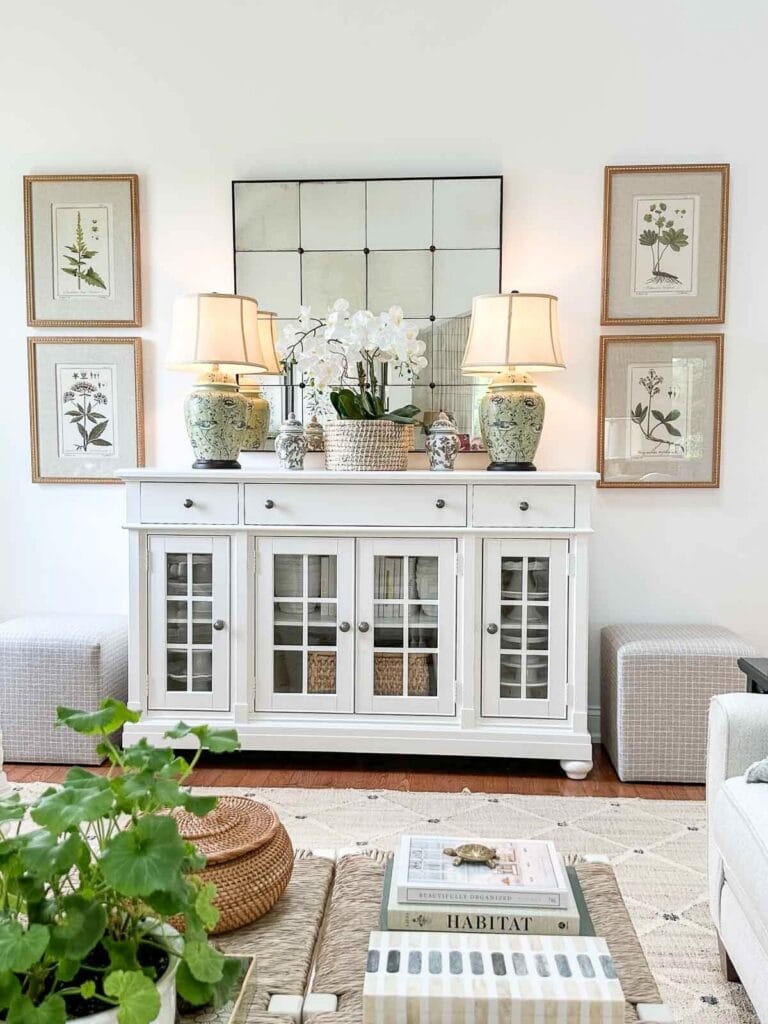 stacked botanicals on either side of the white buffet