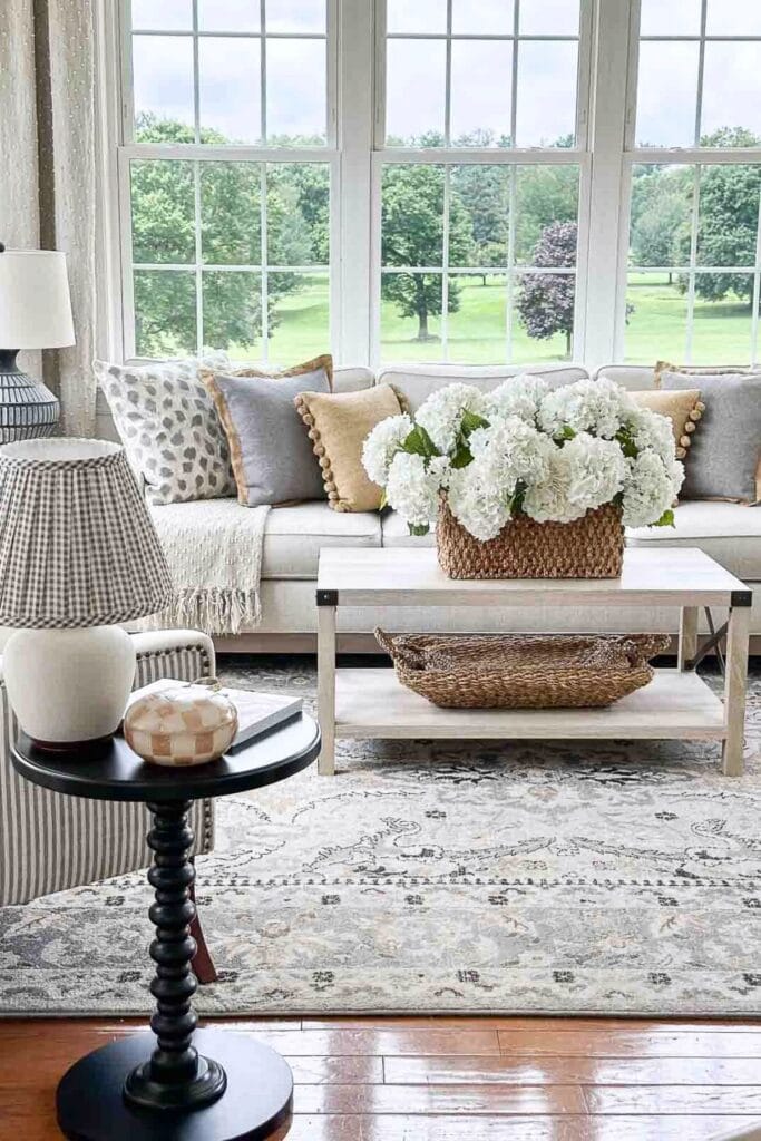 WWW #213- StoneGable Sunroom with basket of hydrangeas
