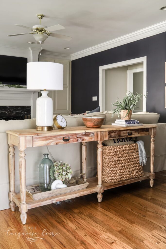 console behind a sofa