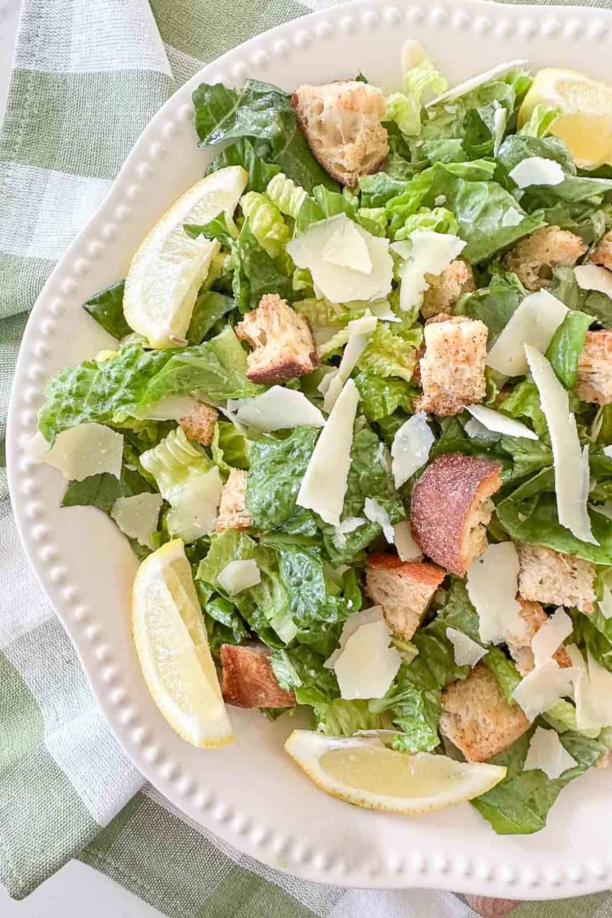 Caesar salad in a white bowl
