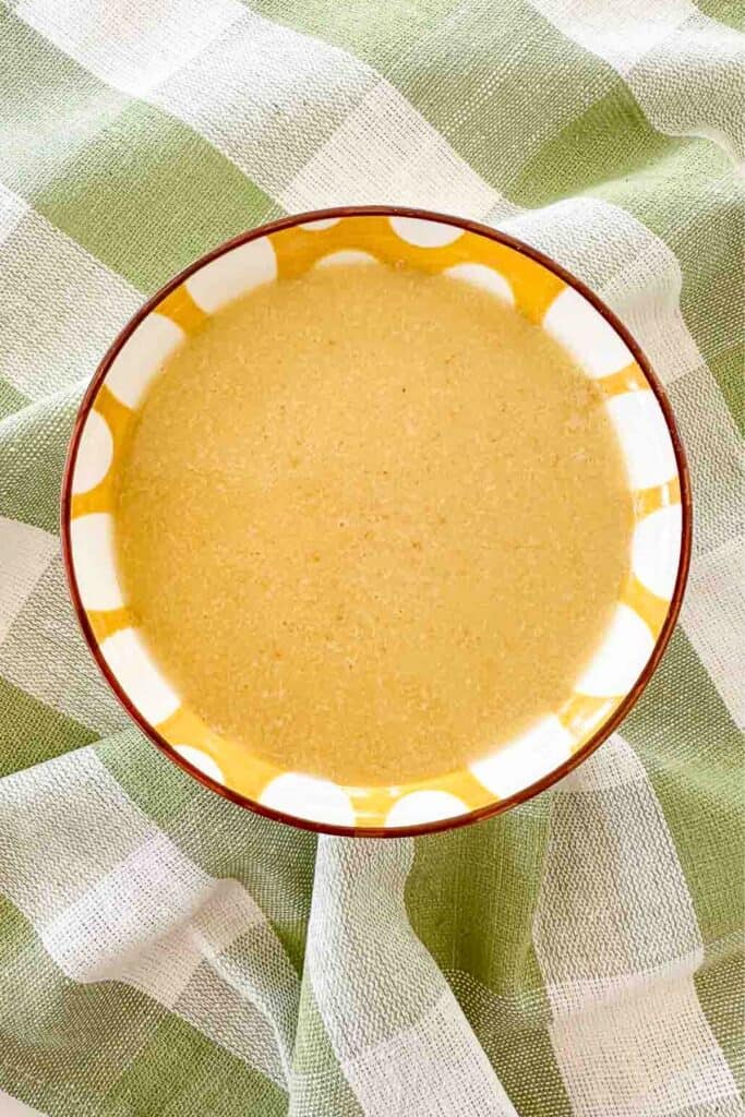 bowl of Caesar salad dressing