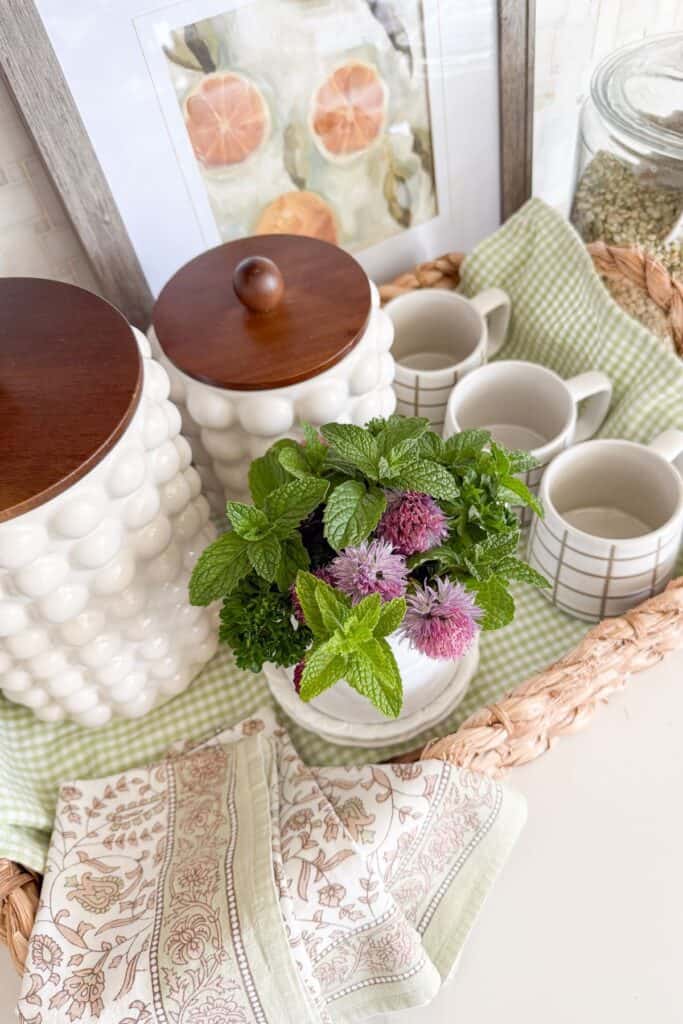 top view of coffee station with a kitchen towel lining the basket
