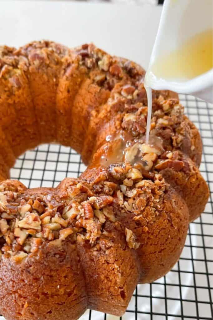 Bacardi rum bundt cake topped with chopped pecans, one of five fall dessert recipes perfect for gatherings and holidays.