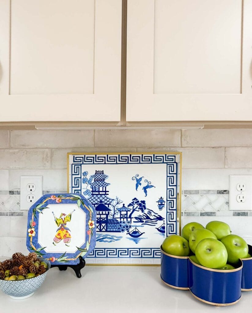 blue and white dishes on a kitchen counter