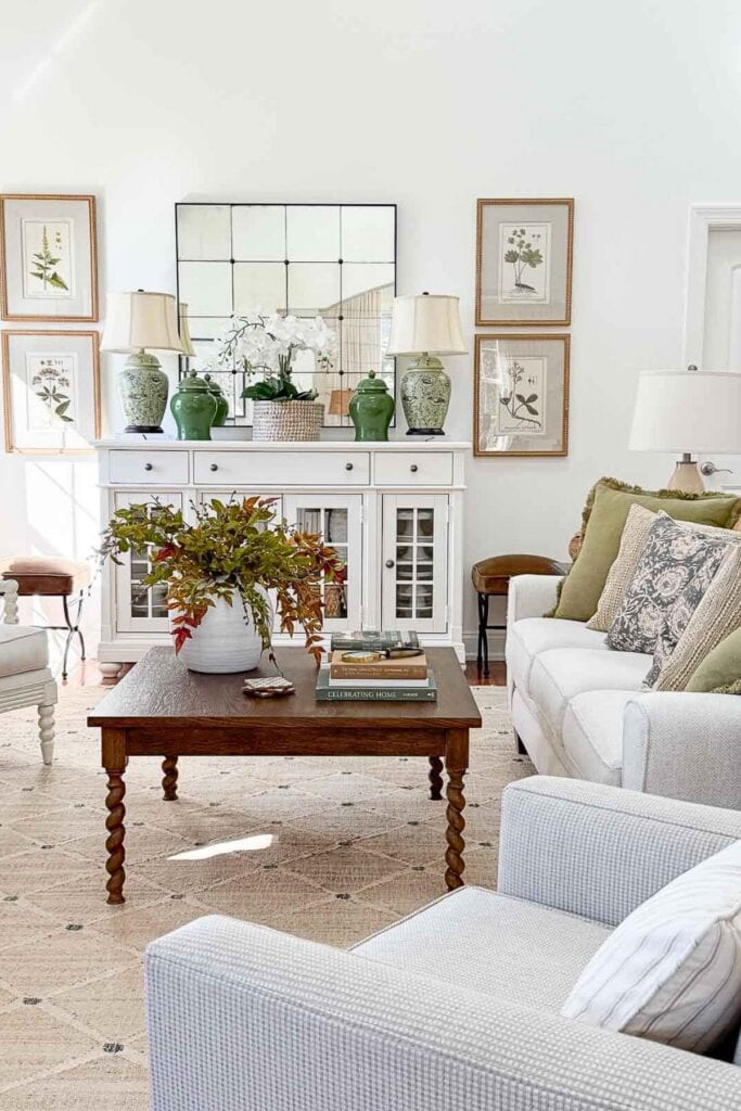 living room with a plant on the coffee table