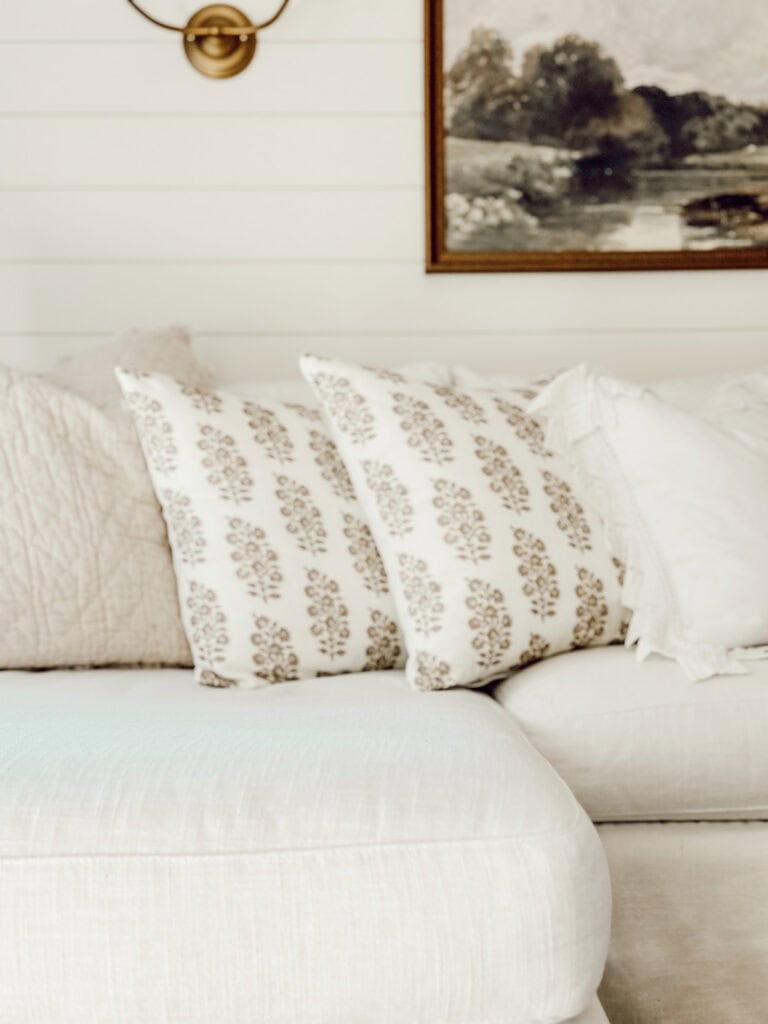 pretty neutral pillows on a sectional