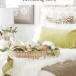 What’s trending in Christmas decorating 2025 — cozy bedroom with soft layered textures, natural Christmas greenery, and warm holiday accents.
