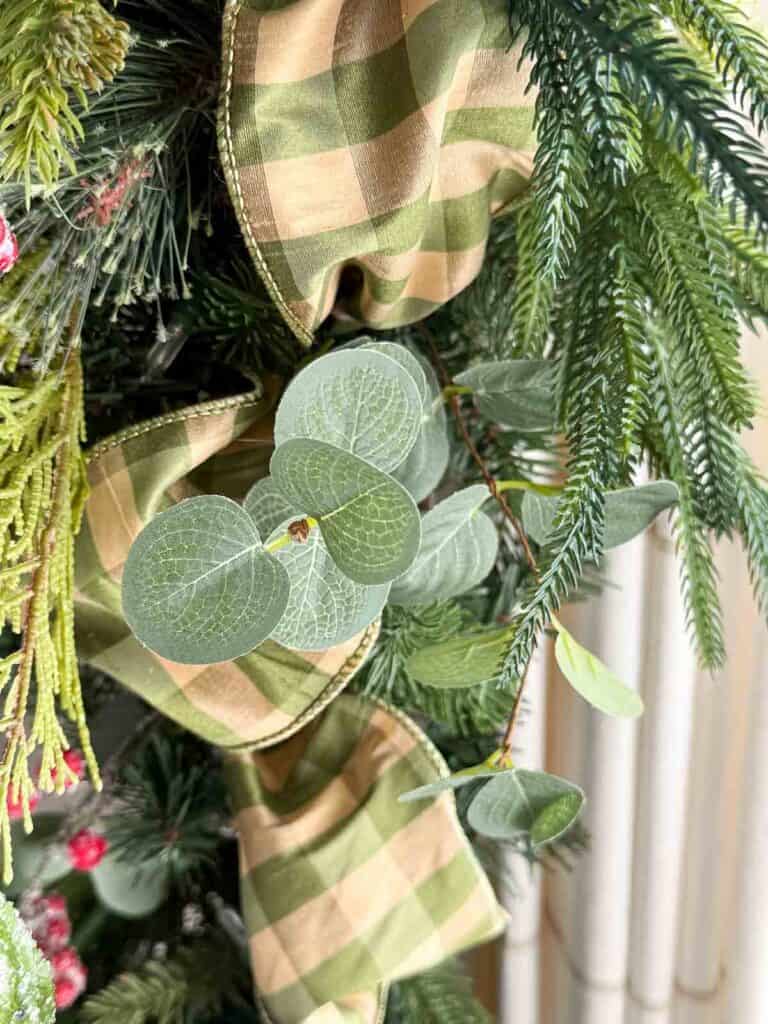 faux eucalyptus tucked into the galand.