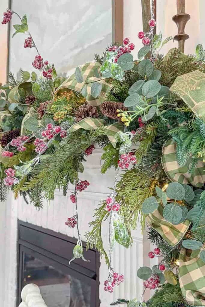 Christmas Tour 2025-Christmas garland with greens, ribbons, and berries