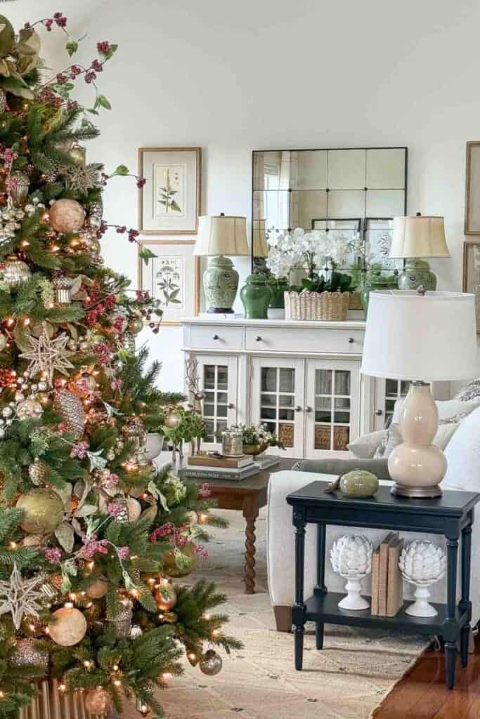 Christmas Tour 2025- a white buffet in a living room decorated for Christmas