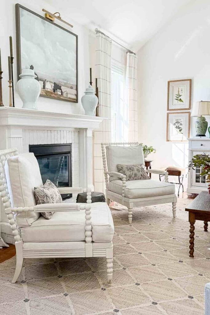 spindle chairs flanking the fireplace