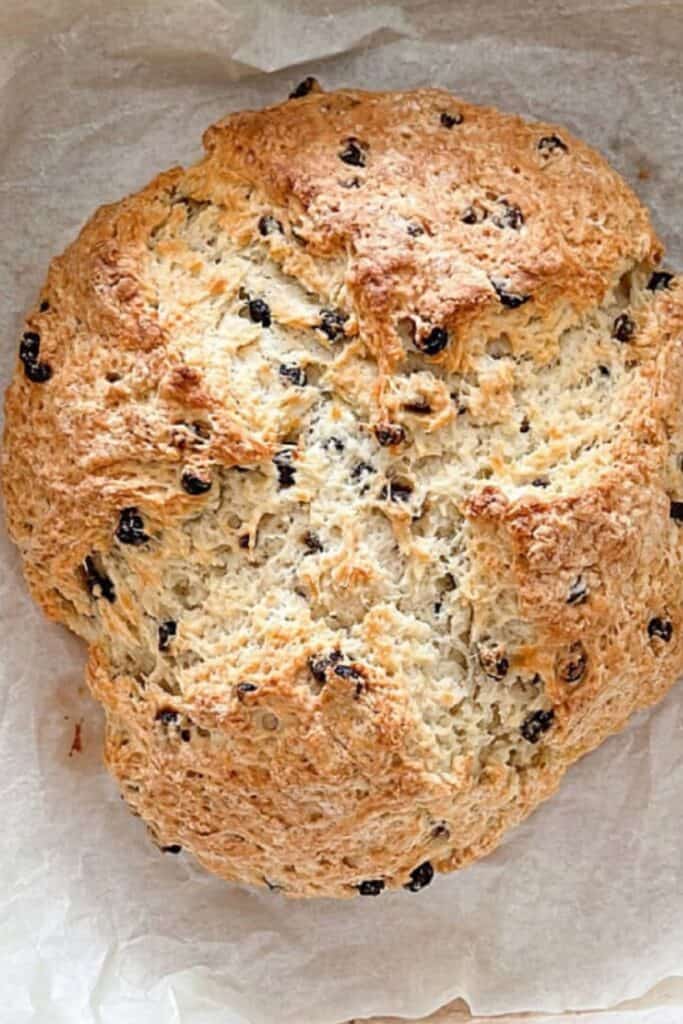 Homemade Irish soda bread baked until golden brown with a rustic crust and currants, a best loved recipe of 2025