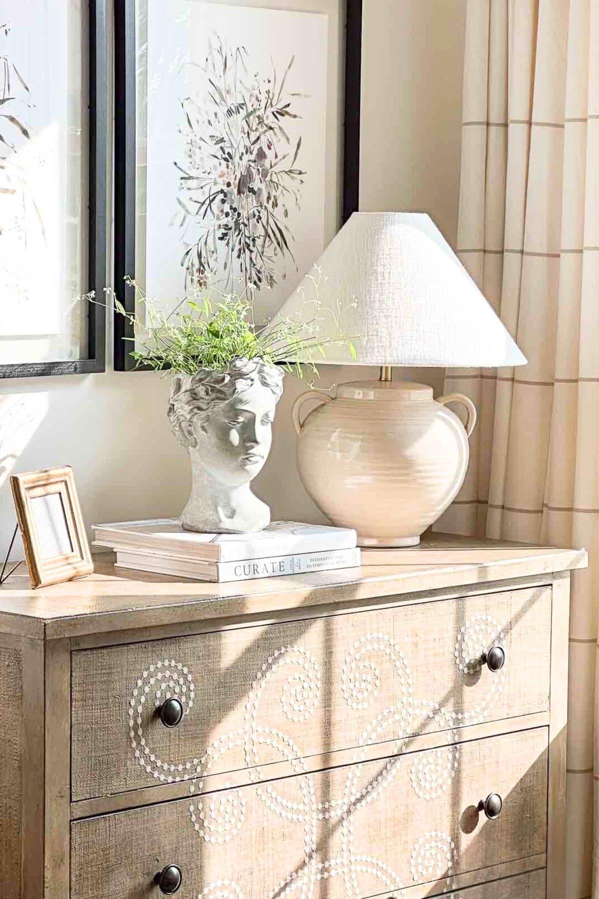 goddess head on a neutral chest