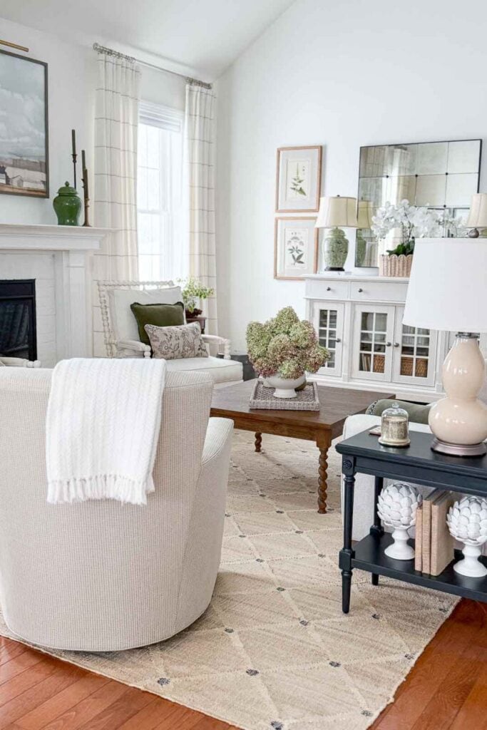 old coffee table mixed with modern swivel chair in the living room