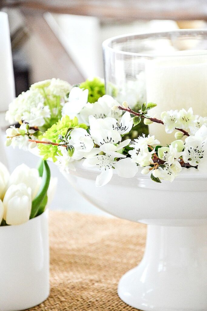 20 minute spring centerpiece with white candle blossoms and green flowers in pedestal bowl