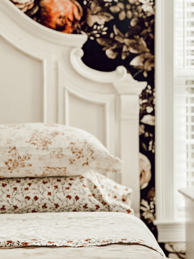 white headboard and bedding on a bed