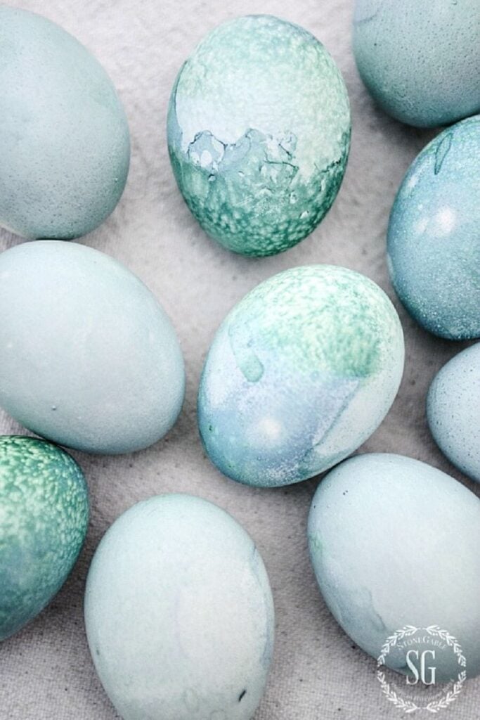 Naturally dyed blue Easter eggs with soft marbled patterns