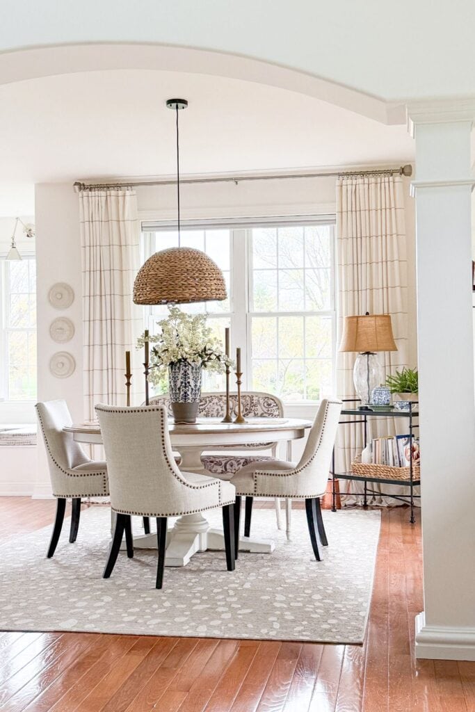 dining room with a large rug grounding the table