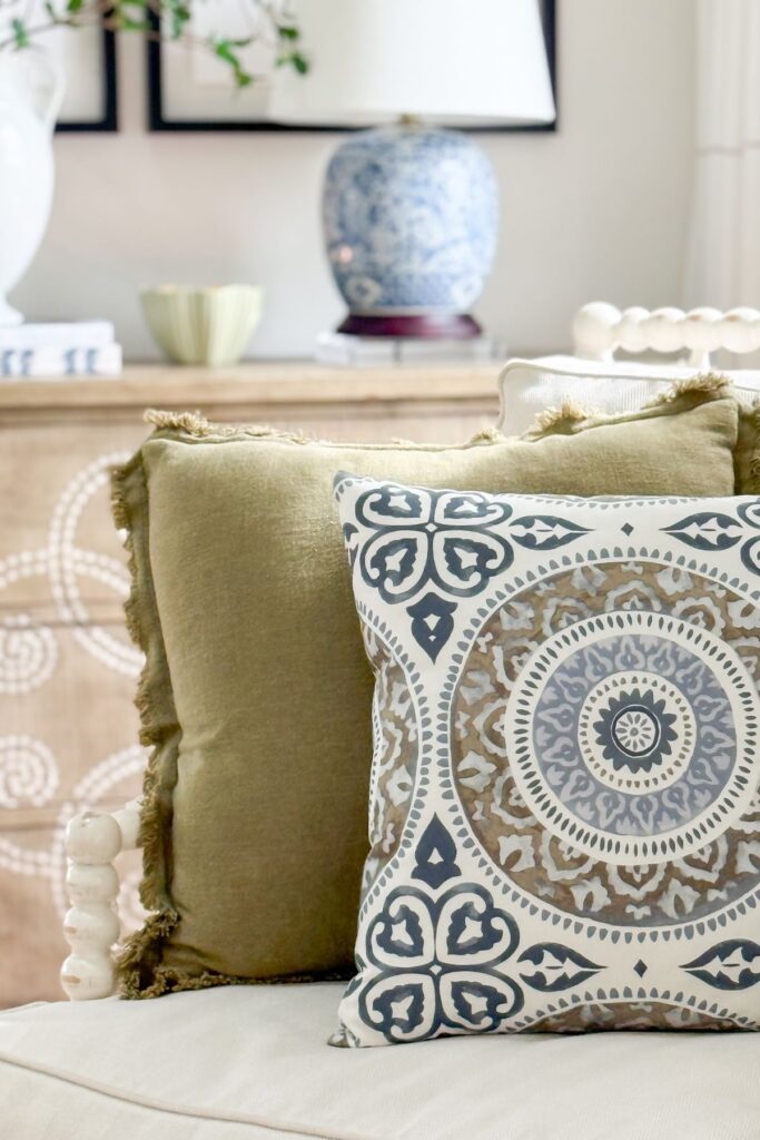 colorful pillows on a spindle chair in the living room