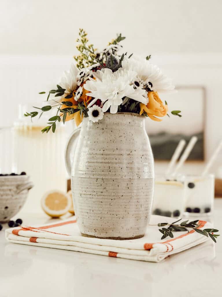 a crock of pretty flowers