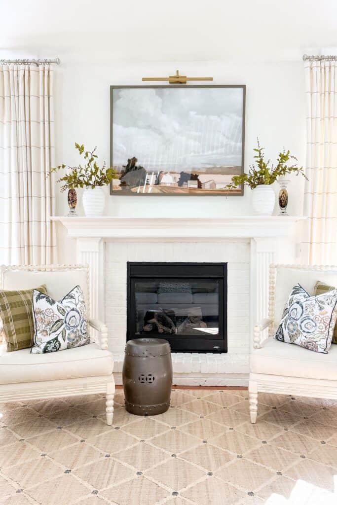 living room mantel- large painting above it