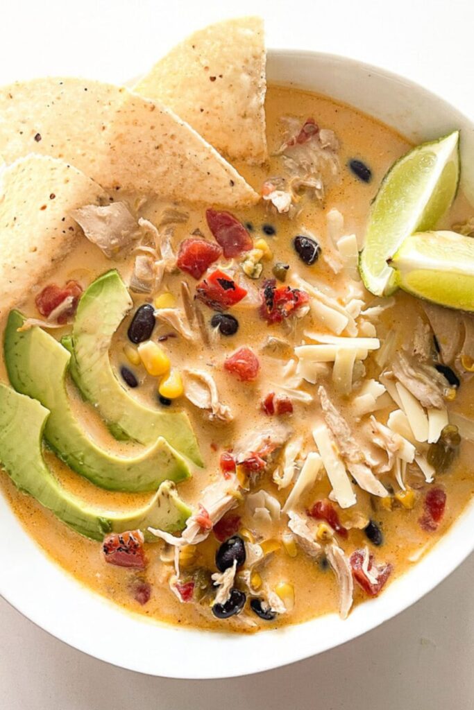 close-up of white chicken chili in a white bowl