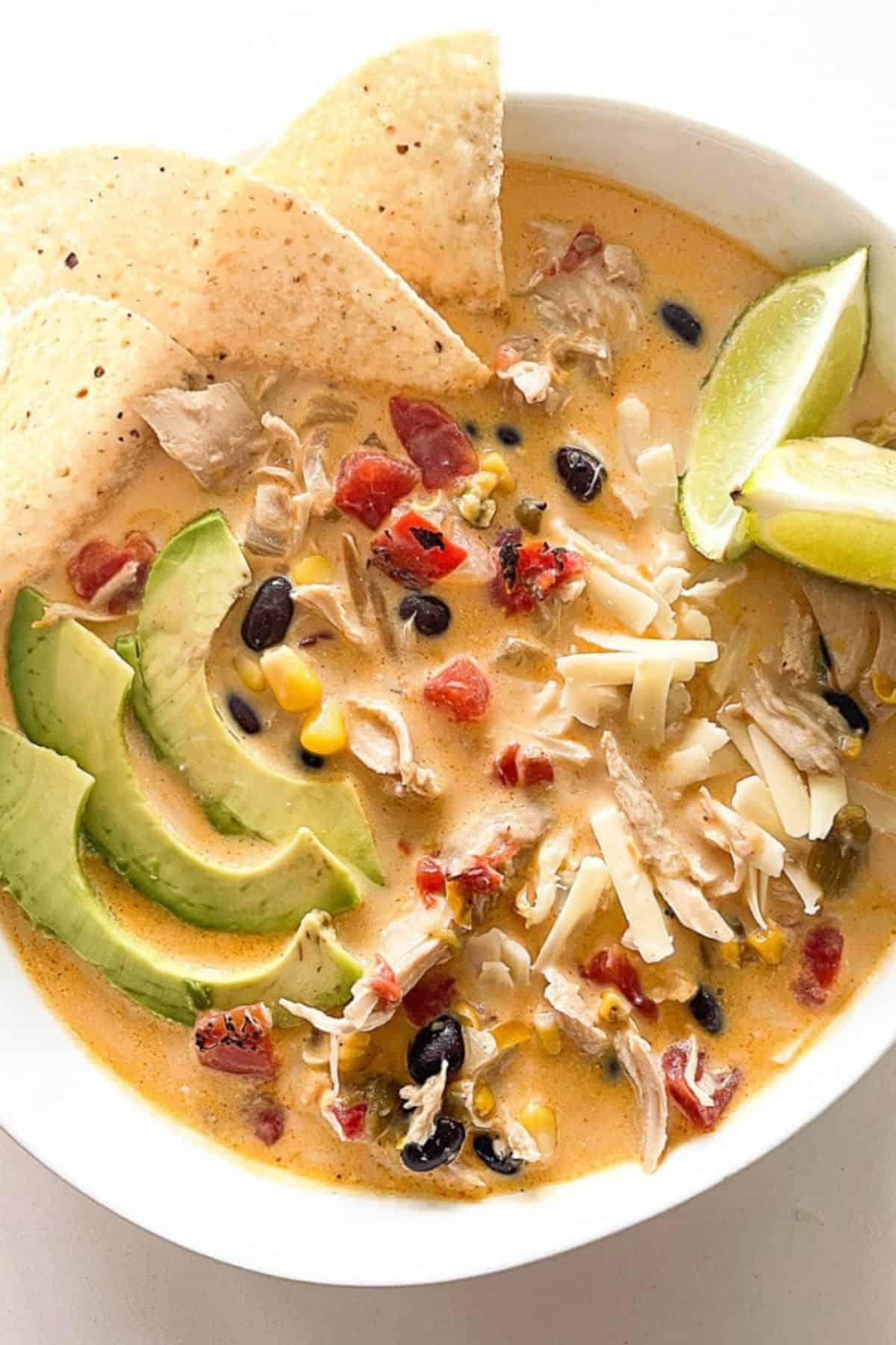 close-up of white chicken chili in a white bowl