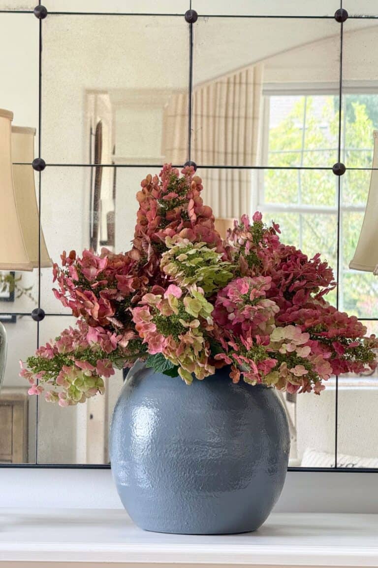 red dried hydrangeas in a blue vase