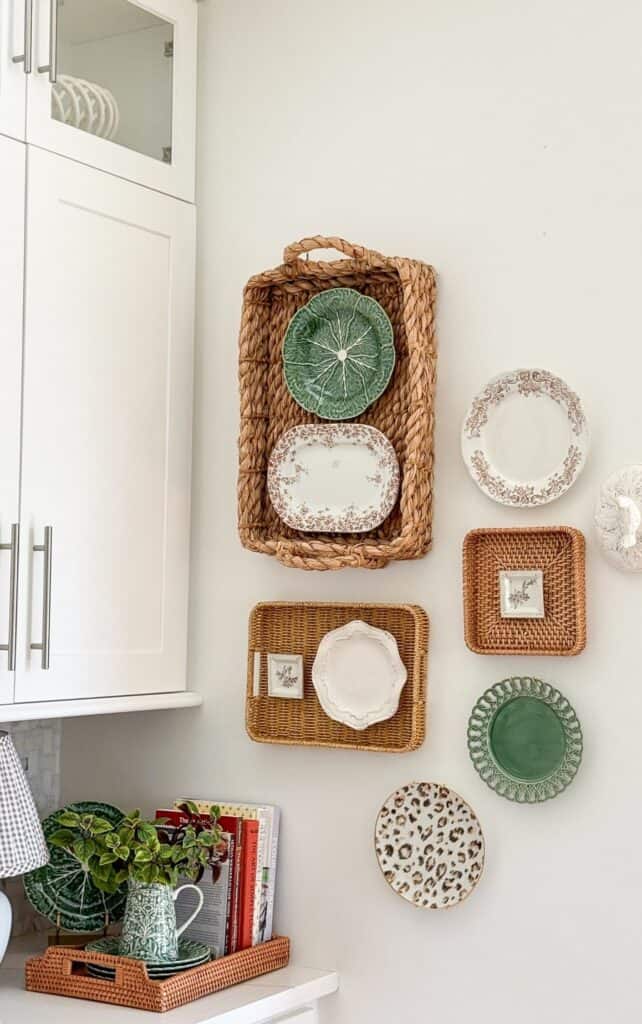 Basket and plate wall arrangement with a leopard print plate anchoring the bottom