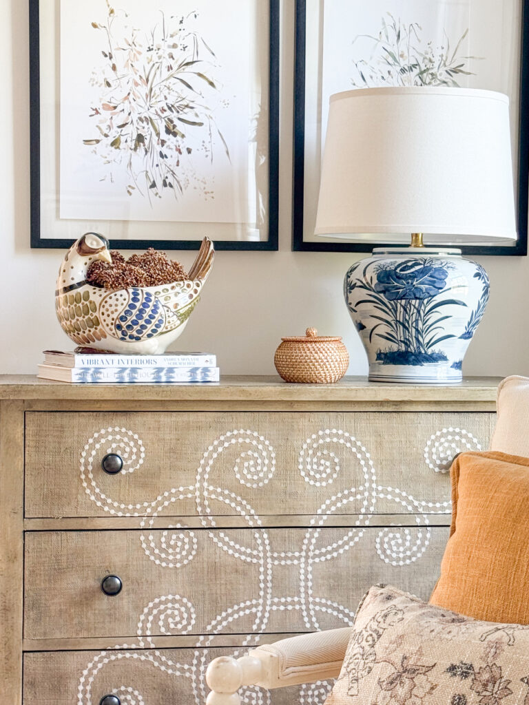 fall decor on a painted chest