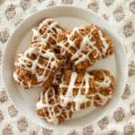 pumpkin spice cookies on a white cake plate