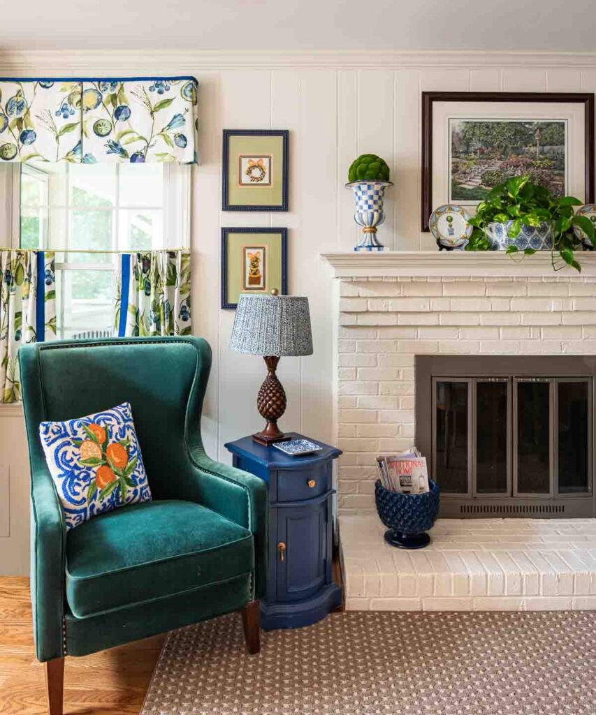 colorful room with a brick fireplace